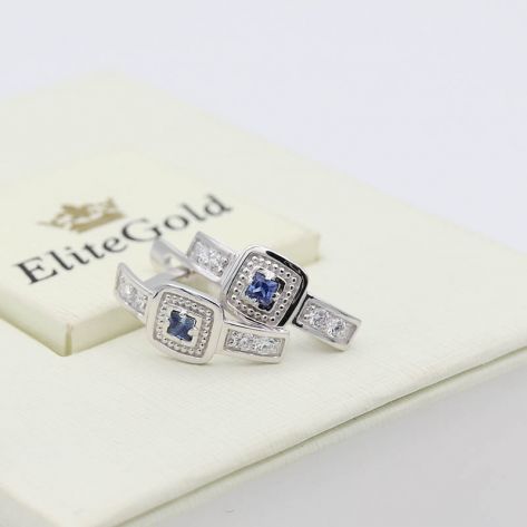 в белом золоте с фианитами и сапфирами в центре