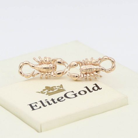 серьги в виде скорпионов