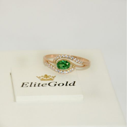 женское дизайнерское кольцо с овальным камнем зеленого цвета