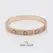 Rigid bracelet with scattered Cartier stones