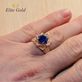 кольцо-цветок с синим камнем на руке