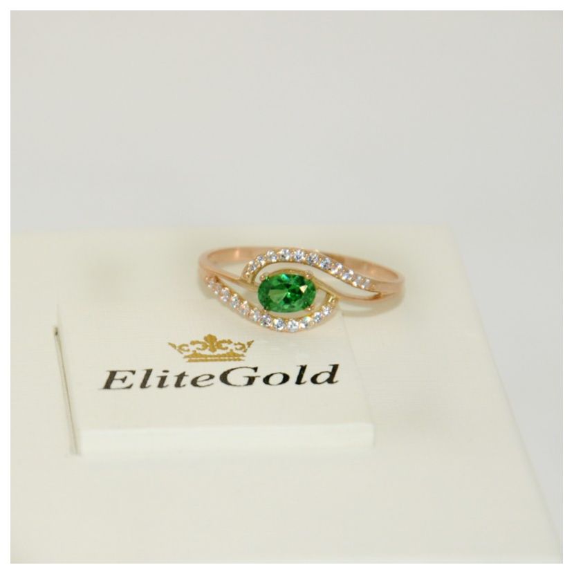 женское дизайнерское кольцо с овальным камнем зеленого цвета