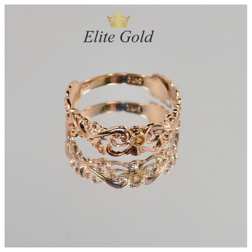 женское ажурное кольцо с узорами в красном золоте с цитрином
