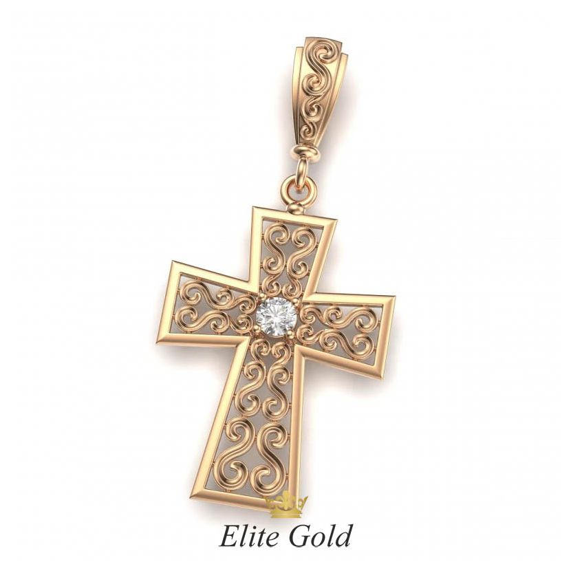 Золотой крест с узорами и камнем