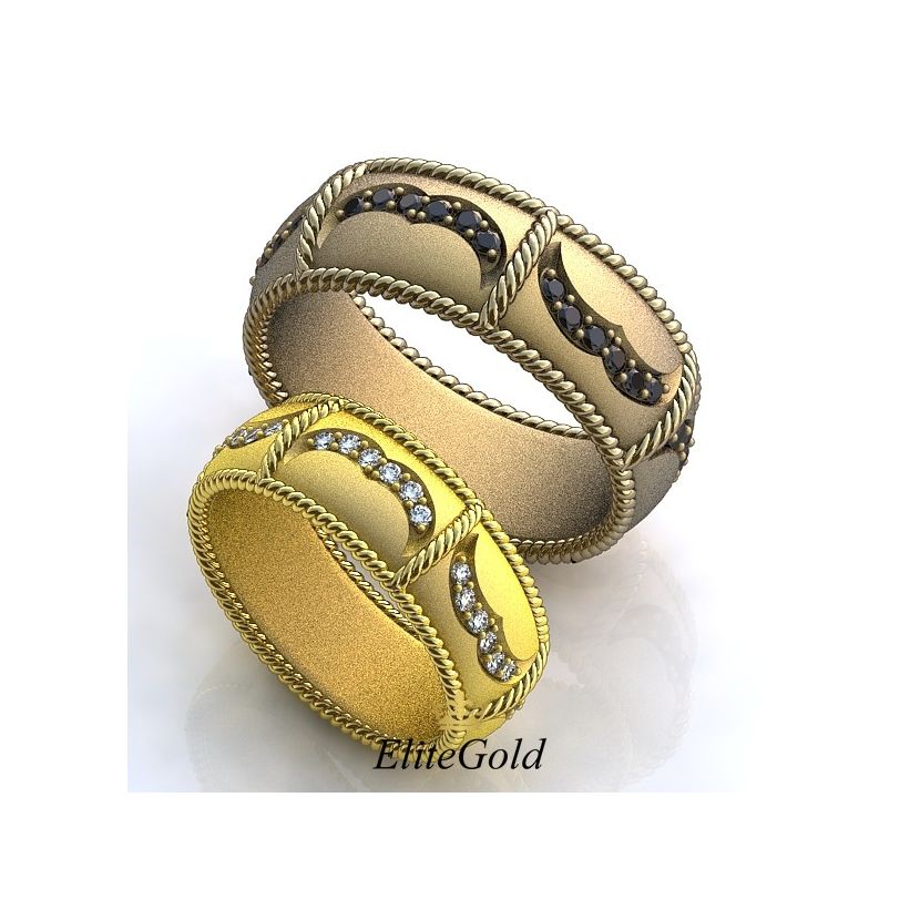 Авторские обручальные кольца Fabiosa с переплетением и камнями