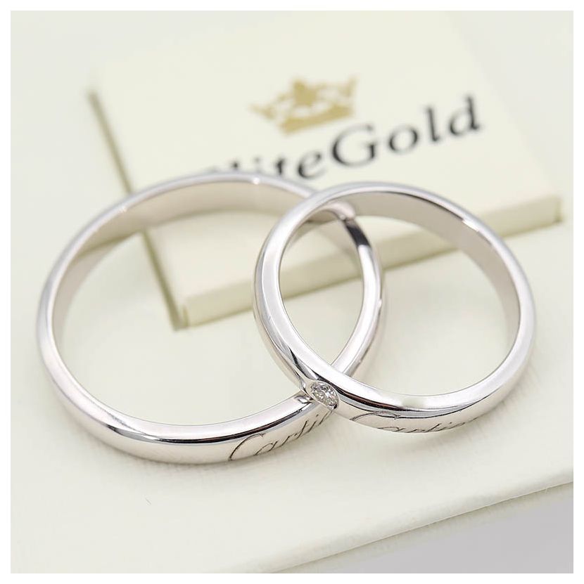 Классические обручальные кольца с надписью Картье в белом золоте